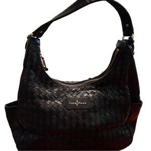 Cole Haan black leather shoulder bag.